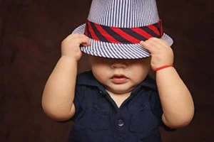 strong boy with hat